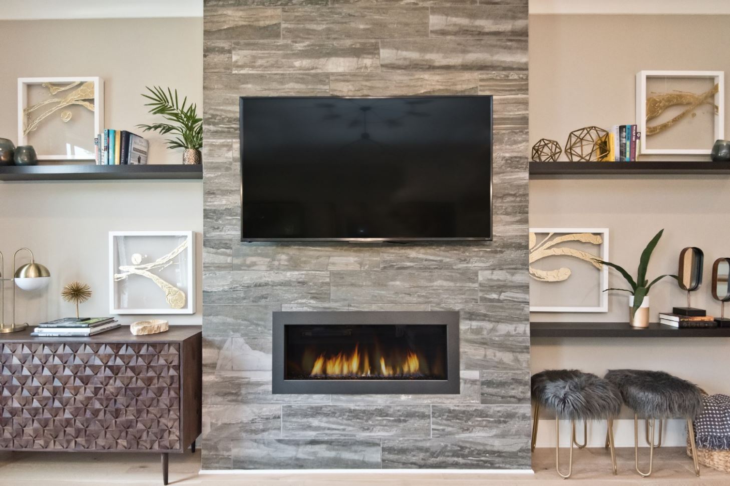 Sleek accents and modern built-ins surrounding your fireplace add functionality and style.