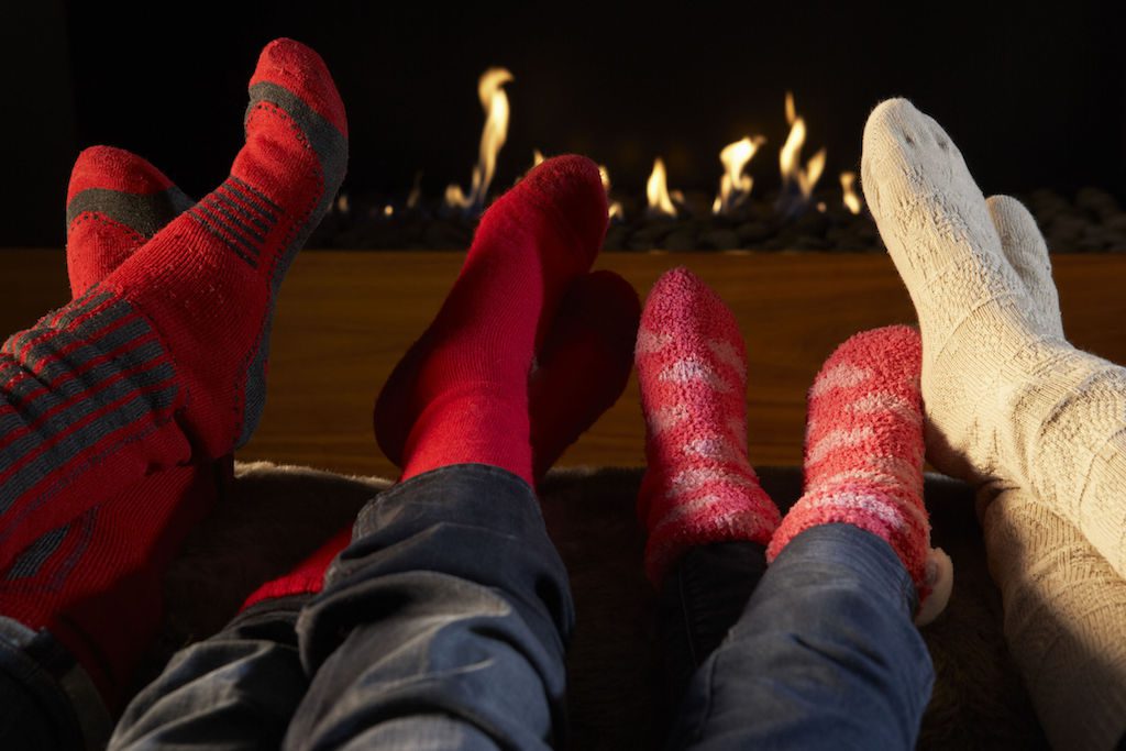 Enjoy precious holiday memories by the warm fireplace in your new Brock Built home. credit: Cathy Yeulet 123rf com