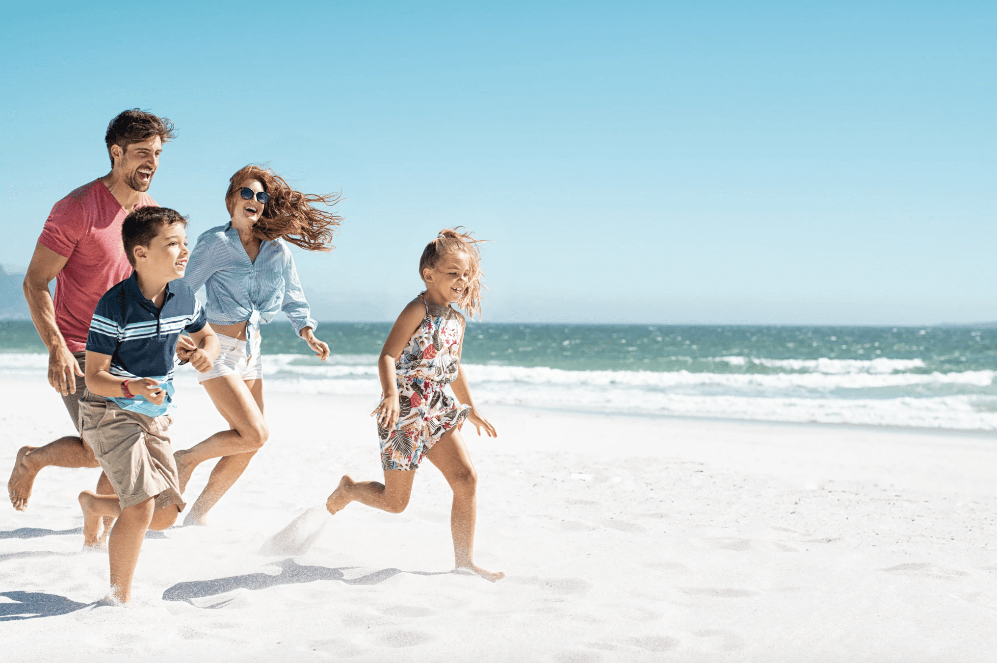 Family running on 30A Beaches