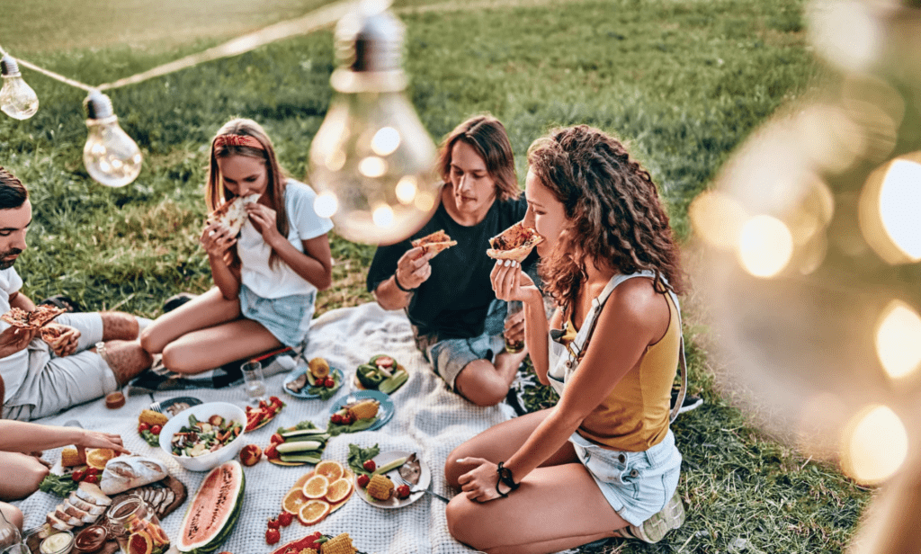 Group of friends having a picnic in Marietta Sqaure