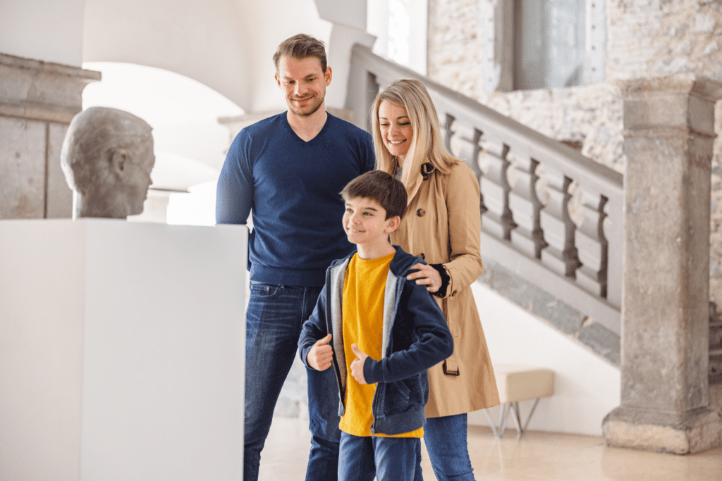 Family looking at exhibit in a museum in marietta